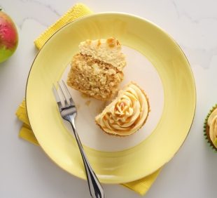 sticky caramel apple cupcake on a yellow plate